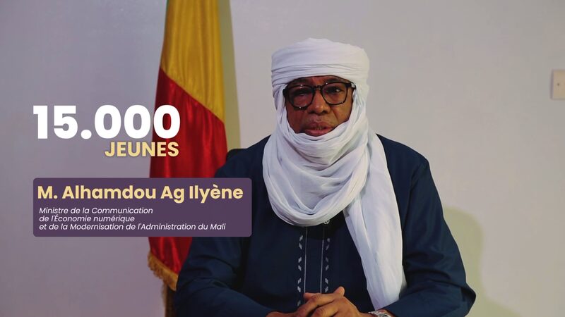 M. Alhamdou Ag Ilyène, Mali's Minister in charge of the digital economy, in the national enrollment spot, beside the words 15,000 jeunes.