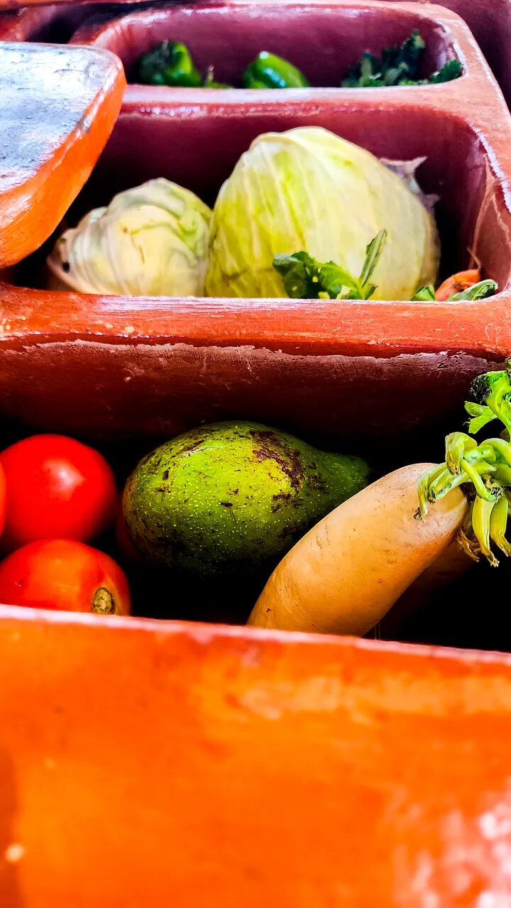 Fresh vegetables kept cool in the clay compartments of a TabliCool.